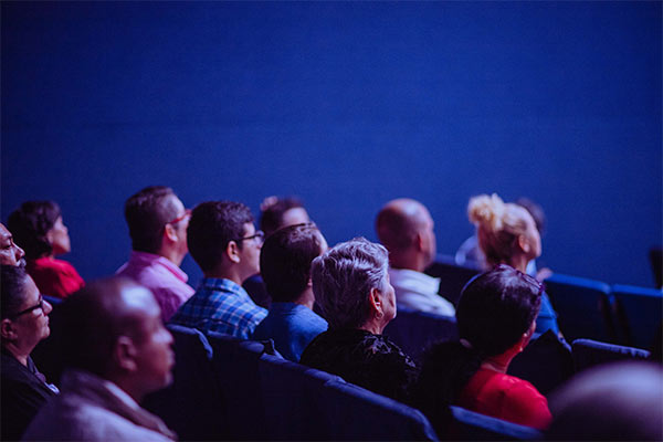 People watching presentation - stock image